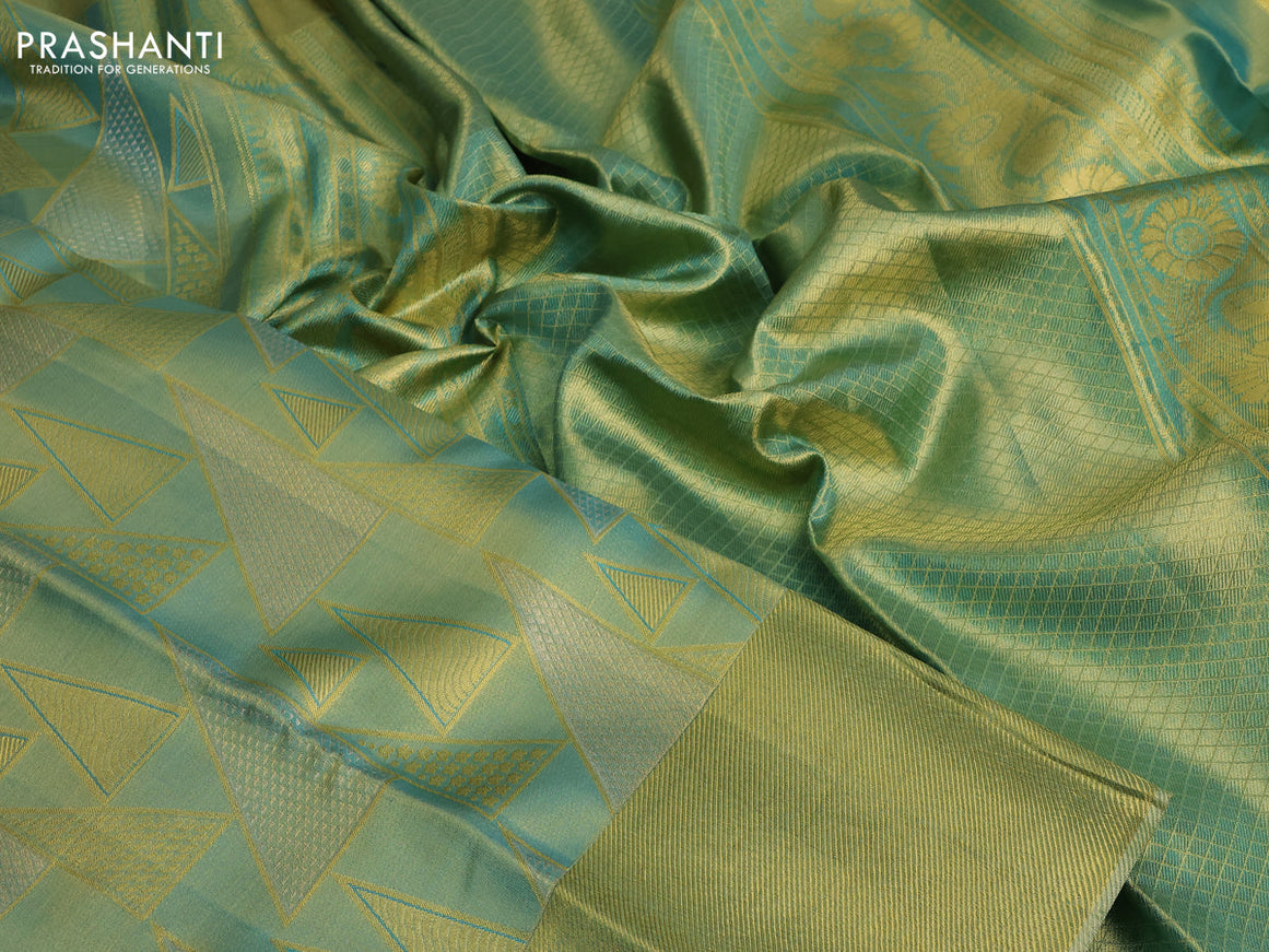 Pure kanchipuram tissue silk saree dual shade of teal blue with allover zari woven geometric weaves and zari woven border