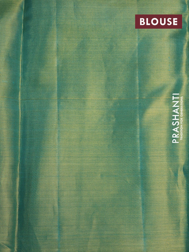 Pure kanchipuram tissue silk saree dual shade of teal blue with allover zari woven geometric weaves and zari woven border