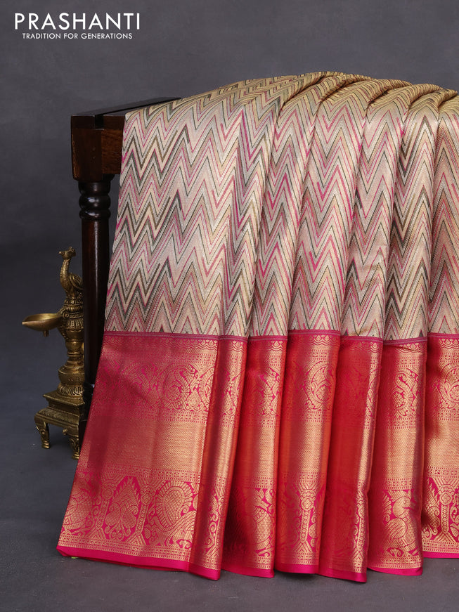 Pure kanchipuram tissue silk saree gold and pink with allover zig zag zari weaves and long zari woven annam border