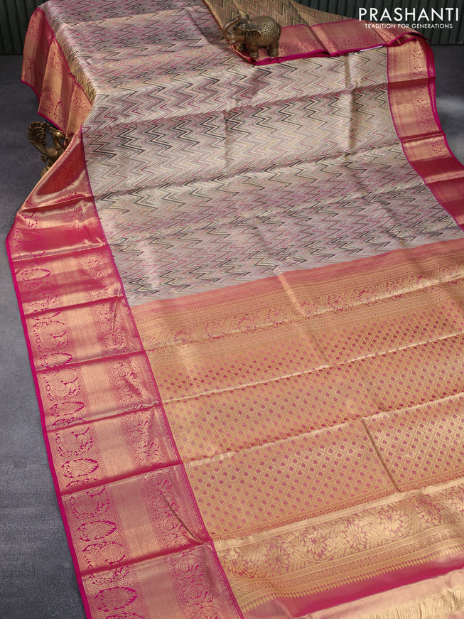 Pure kanchipuram tissue silk saree gold and pink with allover zig zag zari weaves and long zari woven annam border