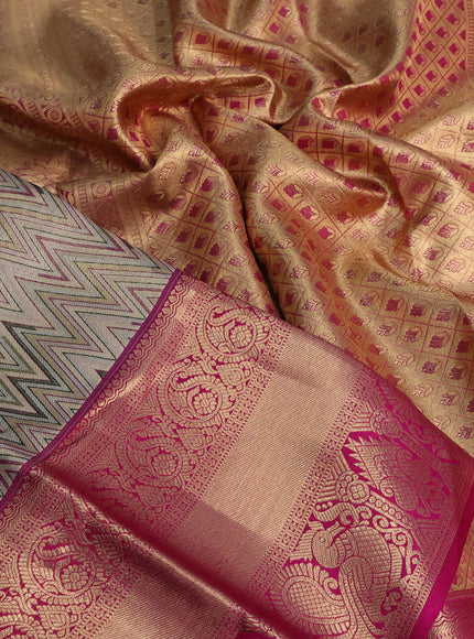 Pure kanchipuram tissue silk saree gold and pink with allover zig zag zari weaves and long zari woven annam border