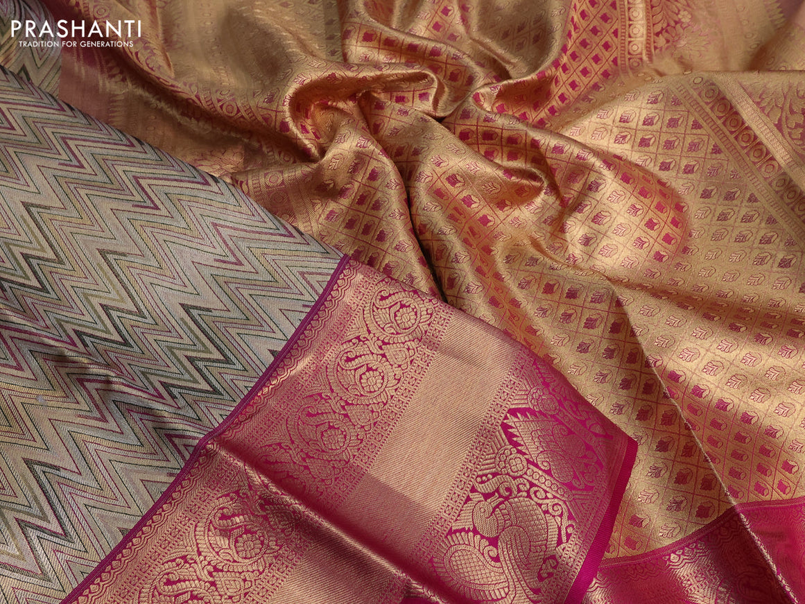 Pure kanchipuram tissue silk saree gold and pink with allover zig zag zari weaves and long zari woven annam border