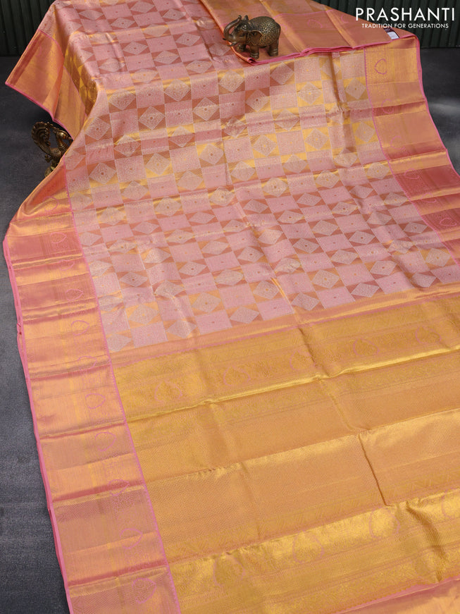 Pure kanchipuram tissue silk saree gold and peach pink with allover silver zari woven geometric weaves and long zari woven border