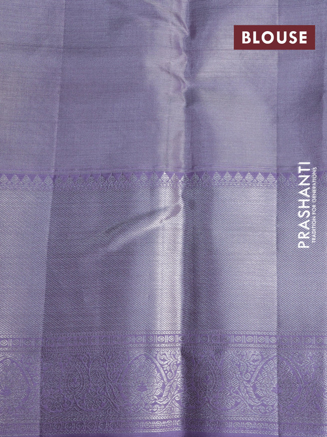 Pure kanchipuram tissue silk saree pastel grey and mild lavender shade with allover silver zari woven weaves and silver zari woven border