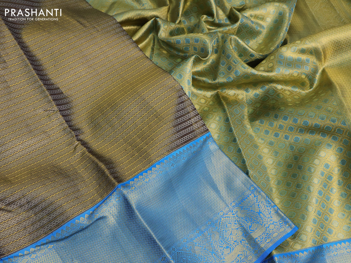 Pure kanchipuram tissue silk saree dual shade of blackish gold and cs blue with allover zari weaves and zari woven border