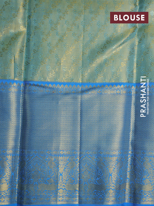 Pure kanchipuram tissue silk saree dual shade of blackish gold and cs blue with allover zari weaves and zari woven border