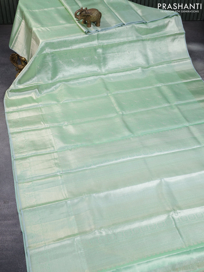 Pure kanchipuram tissue silk saree pastel green with allover silver zari woven brocade weaves and silver zari woven border