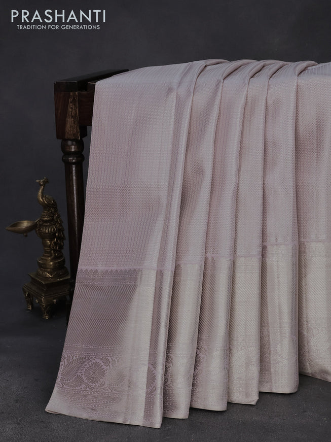 Pure kanchipuram tissue silk saree pastel lavender shade with allover silver zari woven brocade weaves and silver zari woven border