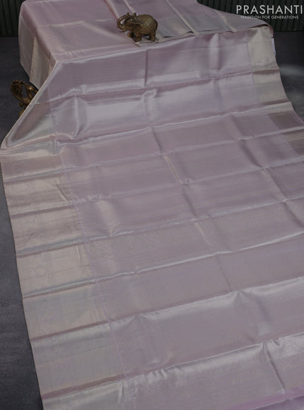 Pure kanchipuram tissue silk saree pastel lavender shade with allover silver zari woven brocade weaves and silver zari woven border