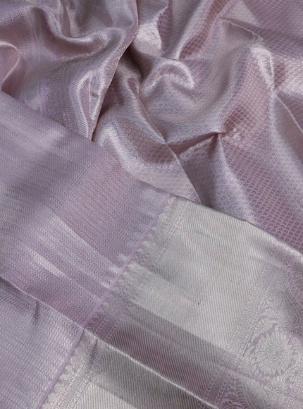 Pure kanchipuram tissue silk saree pastel lavender shade with allover silver zari woven brocade weaves and silver zari woven border