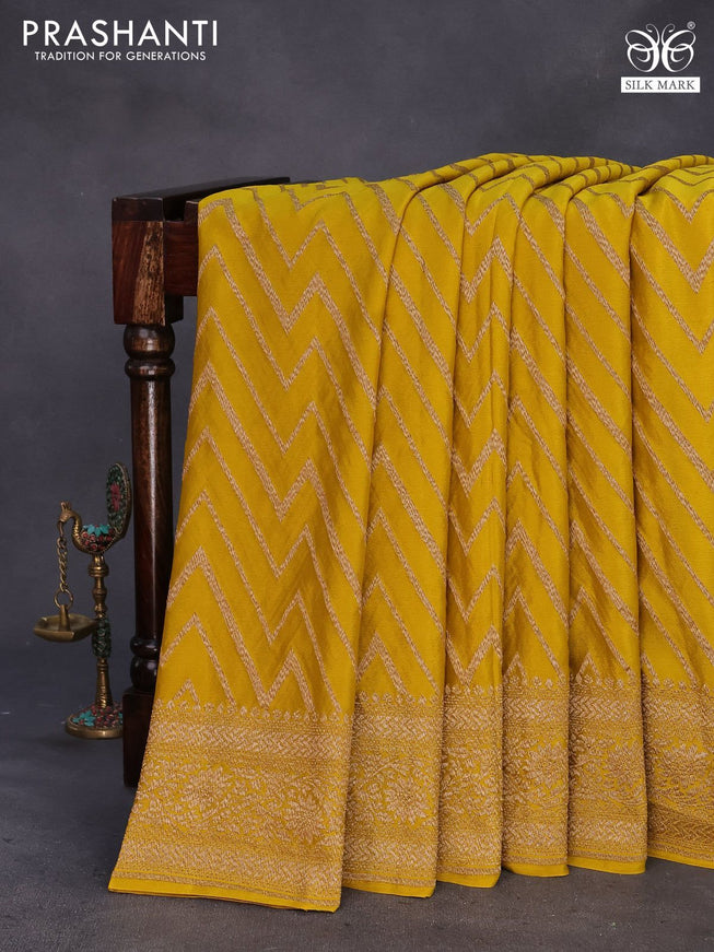 Banarasi crepe silk saree yellow with allover thread & zari zig zag weaves and woven border