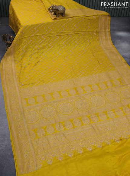 Banarasi crepe silk saree yellow with allover thread & zari zig zag weaves and woven border