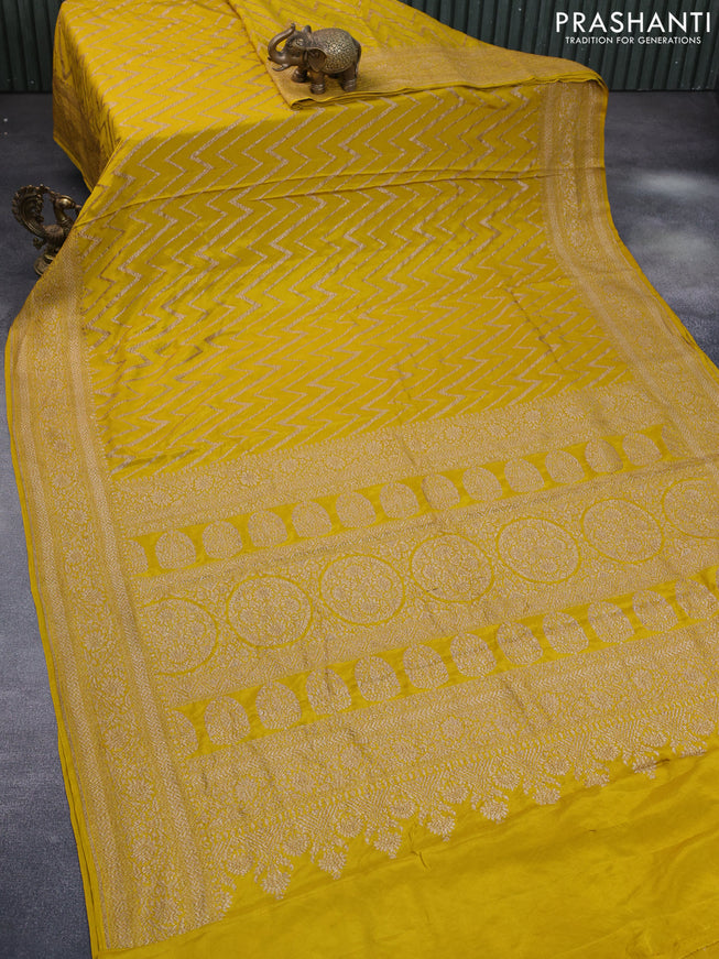 Banarasi crepe silk saree yellow with allover thread & zari zig zag weaves and woven border