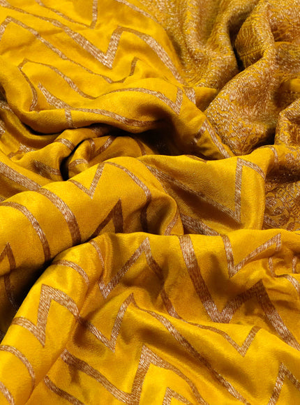 Banarasi crepe silk saree yellow with allover thread & zari zig zag weaves and woven border