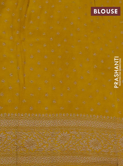 Banarasi crepe silk saree yellow with allover thread & zari zig zag weaves and woven border