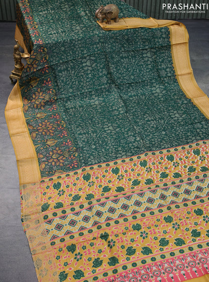 Printed silk saree green and mustard shade with allover prints and thread woven border