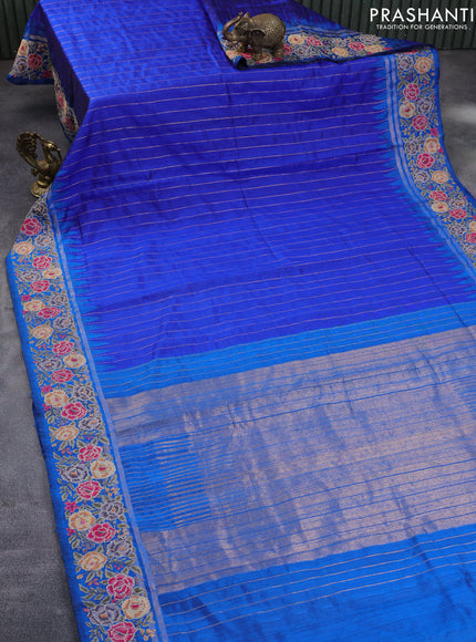 Pure dupion silk saree blue and cs blue with allover zari weaves and temple woven floral design embroidery work border