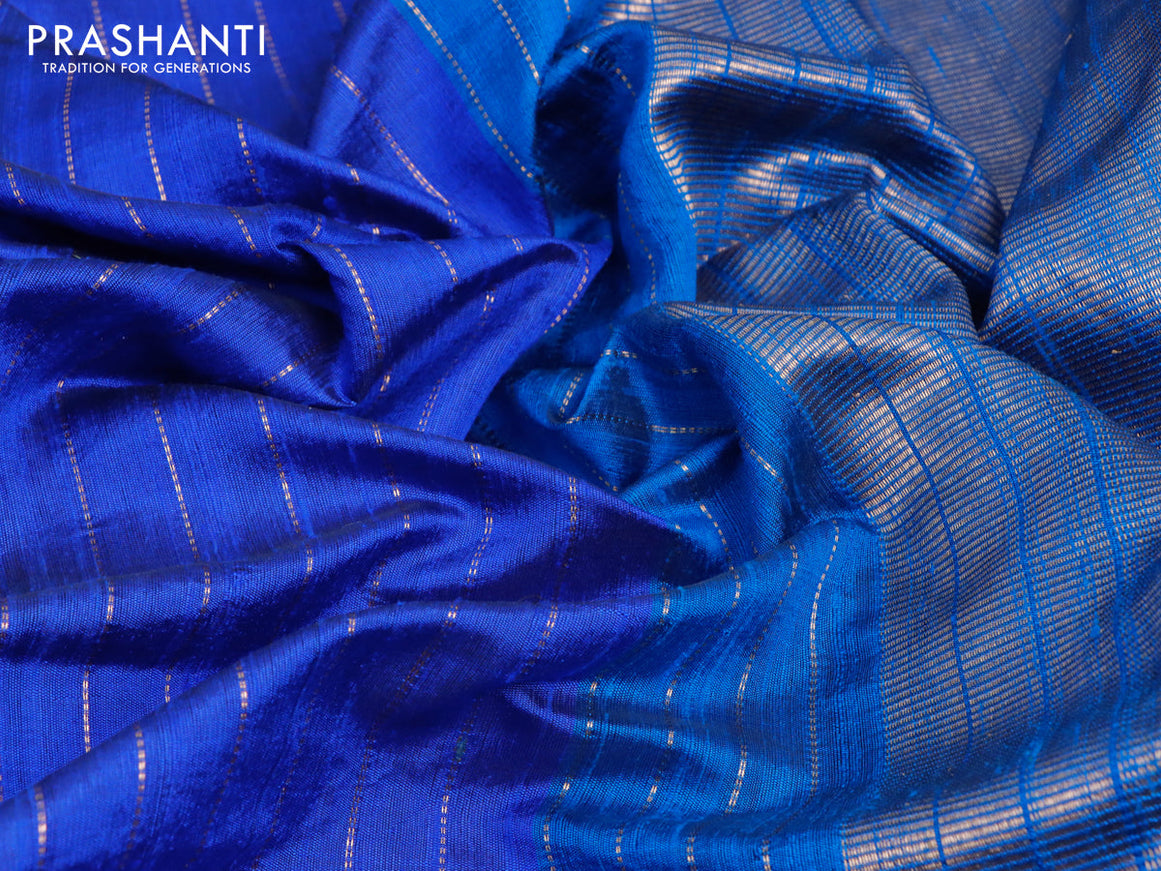 Pure dupion silk saree blue and cs blue with allover zari weaves and temple woven floral design embroidery work border