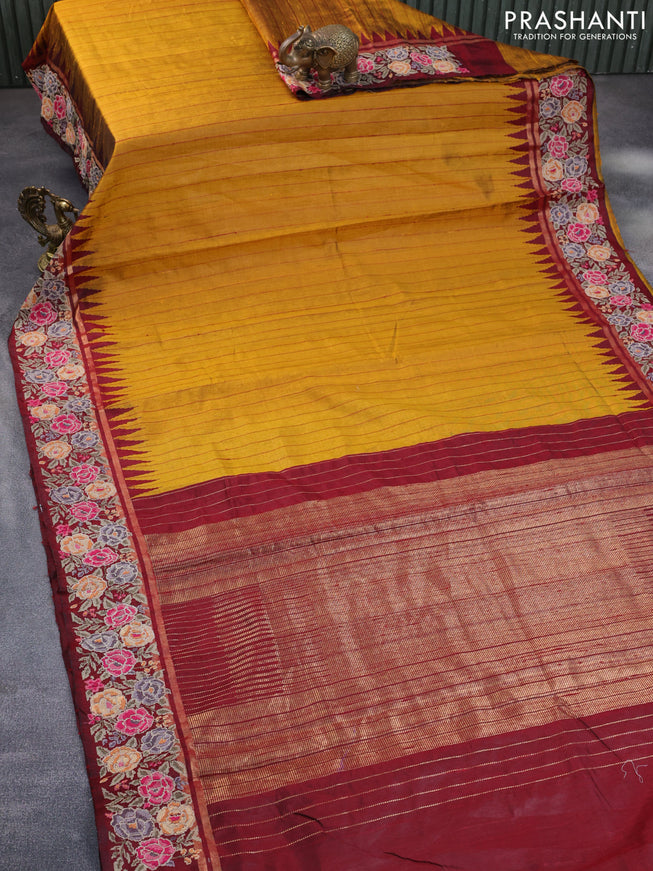 Pure dupion silk saree mustard yellow and maroon with allover zari weaves and temple woven floral design embroidery work border