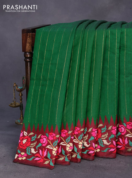 Pure dupion silk saree green and deep maroon with allover zari weaves and temple woven floral design embroidery work border