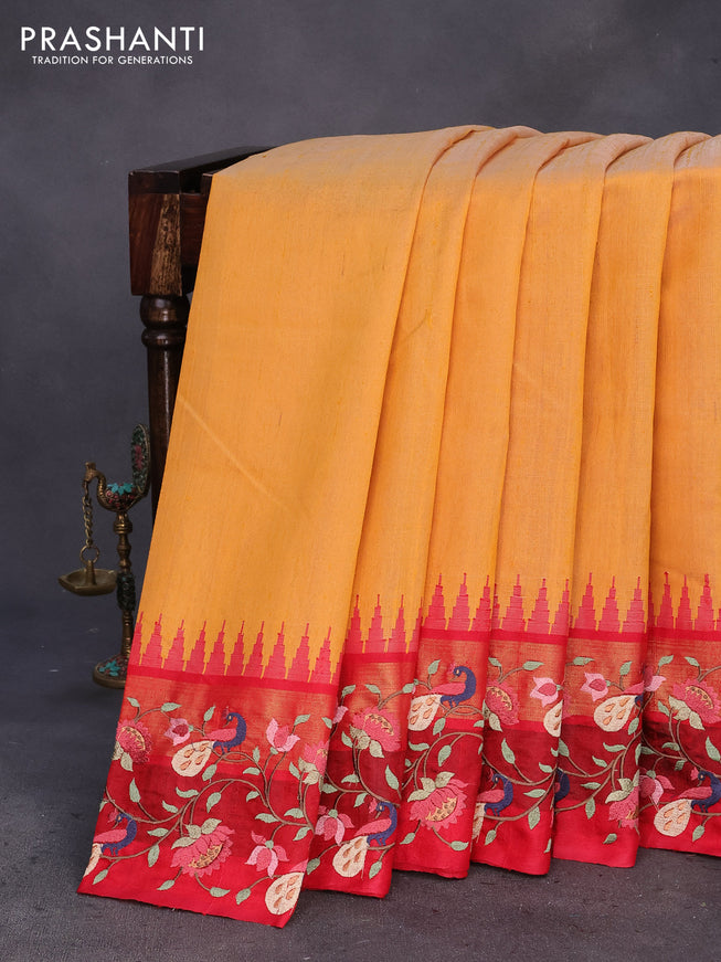 Pure dupion silk saree yellow and red with plain body and temple woven peacock & floral design embroidery work border