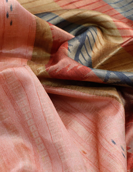 Semi tussar saree pastel peach and multi colour with allover geometric zari weaves & ikat butta prints and temple design border