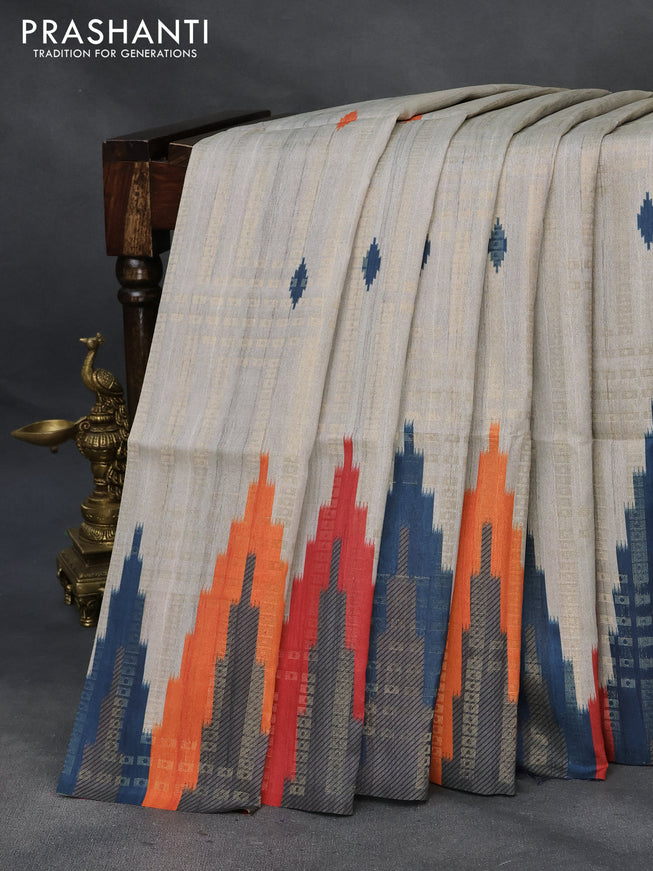 Semi tussar saree grey and peacock blue with allover geometric zari weaves & ikat butta prints and temple design border