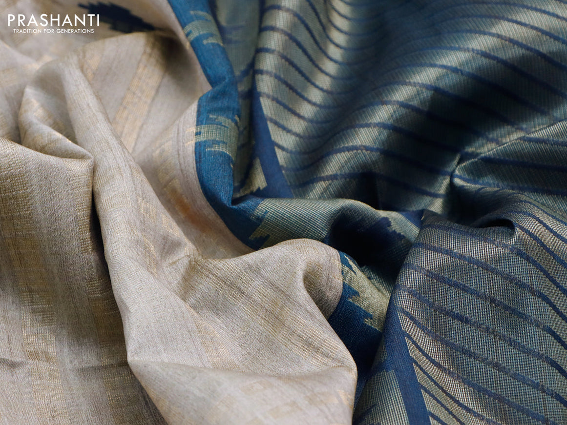 Semi tussar saree grey and peacock blue with allover geometric zari weaves & ikat butta prints and temple design border