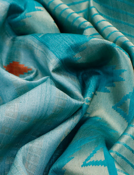 Semi tussar saree teal blue and teal green with allover geometric zari weaves & ikat butta prints and temple design border