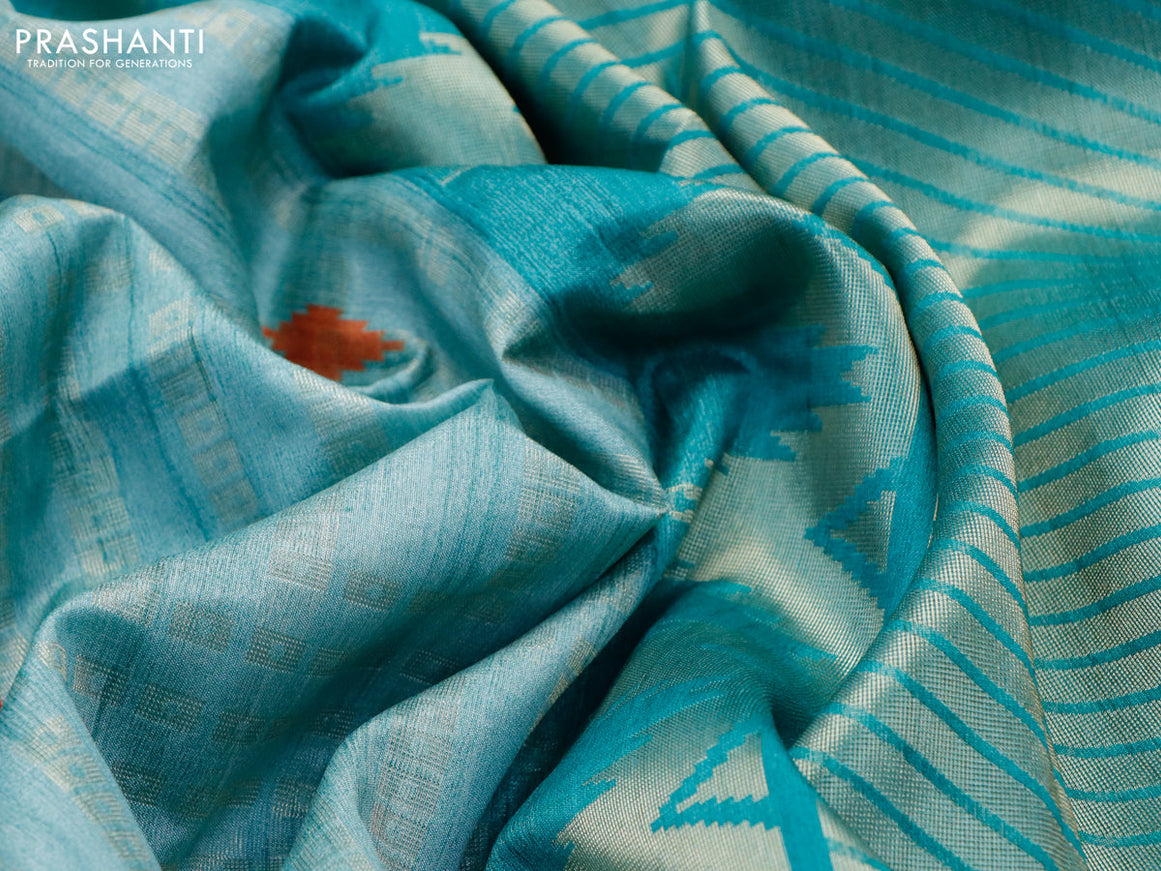 Semi tussar saree teal blue and teal green with allover geometric zari weaves & ikat butta prints and temple design border