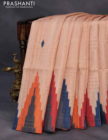 Semi tussar saree mild peach and orange with allover geometric zari weaves & ikat butta prints and temple design border