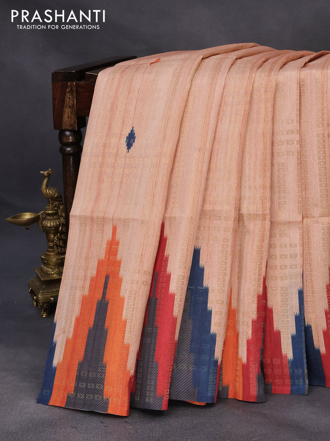 Semi tussar saree mild peach and orange with allover geometric zari weaves & ikat butta prints and temple design border