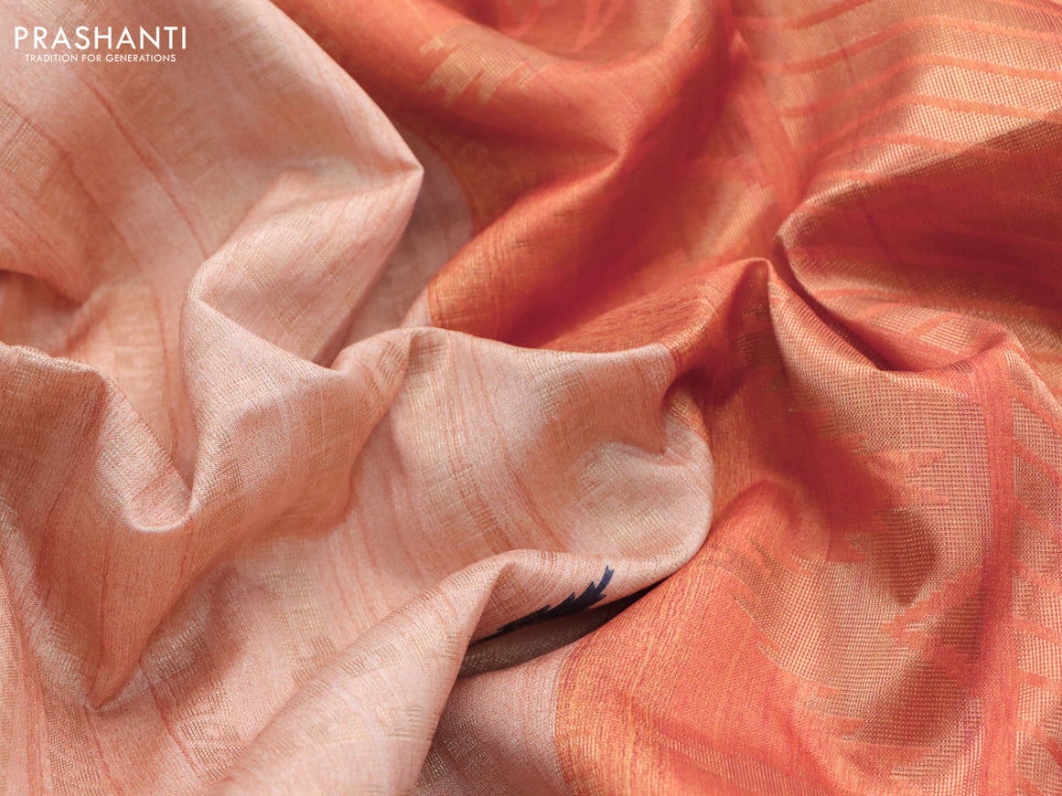 Semi tussar saree mild peach and orange with allover geometric zari weaves & ikat butta prints and temple design border