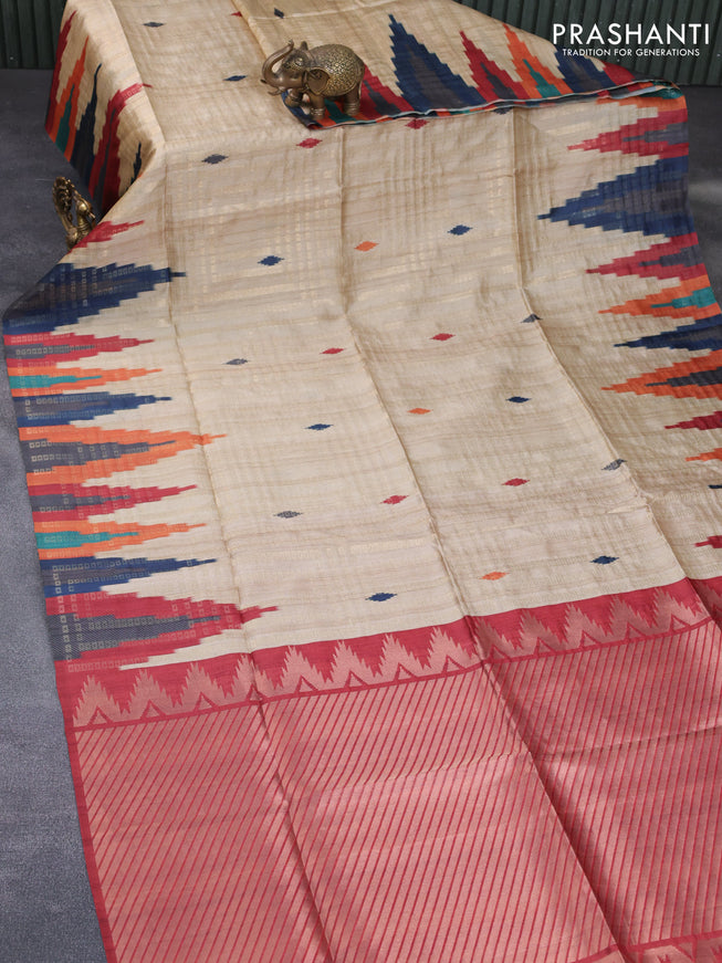 Semi tussar saree sandal and maroon with allover geometric zari weaves & ikat butta prints and temple design border