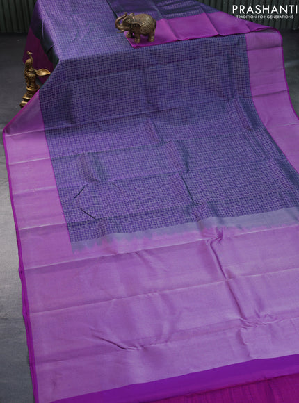 Pure kanchipuram silk saree dual shade of bluish green and purple with allover silver zari woven checked pattern and silver zari woven border