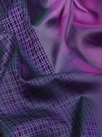 Pure kanchipuram silk saree dual shade of bluish green and purple with allover silver zari woven checked pattern and silver zari woven border