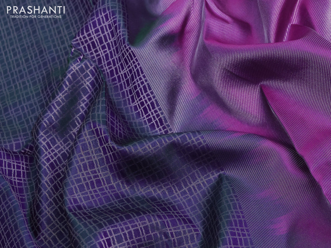 Pure kanchipuram silk saree dual shade of bluish green and purple with allover silver zari woven checked pattern and silver zari woven border