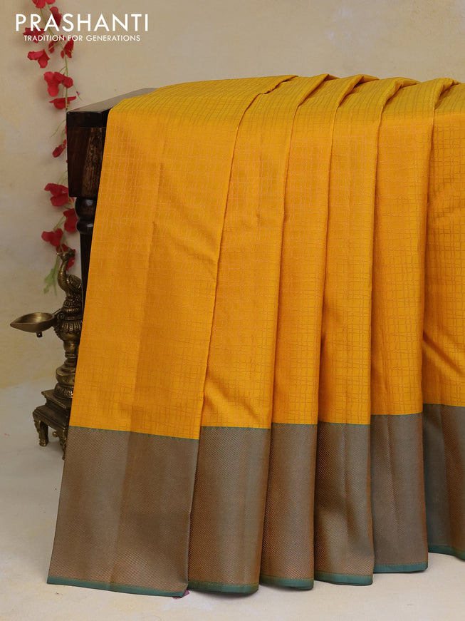 Pure kanchipuram silk saree mustard yellow and dual shade of teal blue with allover copper zari checked pattern and copper zari woven border