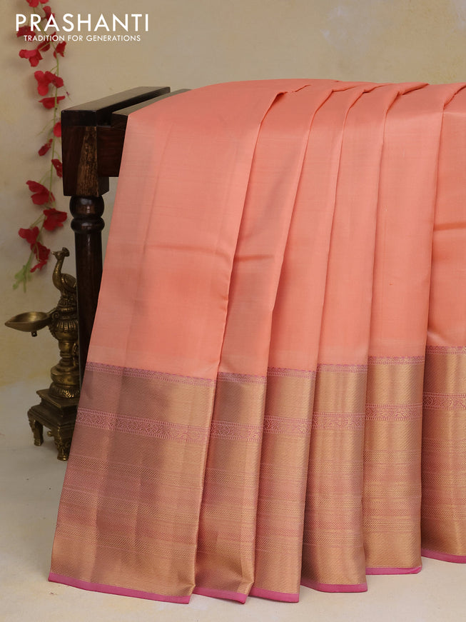 Pure kanchipuram silk saree peach orange and dual shade of pink with plain body and long zari woven border