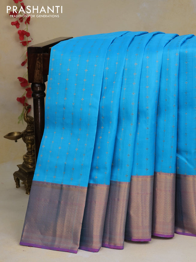 Pure kanchipuram silk saree light blue and dual shade of purple with allover zari weaves and rich zari woven border