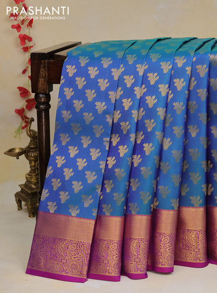 Pure kanchipuram silk saree dual shade of bluish green and dual shade of purple with allover zari woven buttas weaves and rich zari woven border