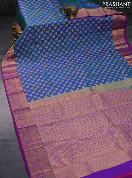 Pure kanchipuram silk saree dual shade of bluish green and dual shade of purple with allover zari woven buttas weaves and rich zari woven border