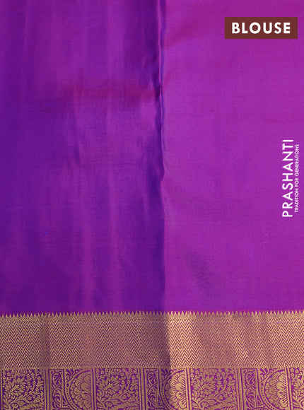 Pure kanchipuram silk saree dual shade of bluish green and dual shade of purple with allover zari woven buttas weaves and rich zari woven border