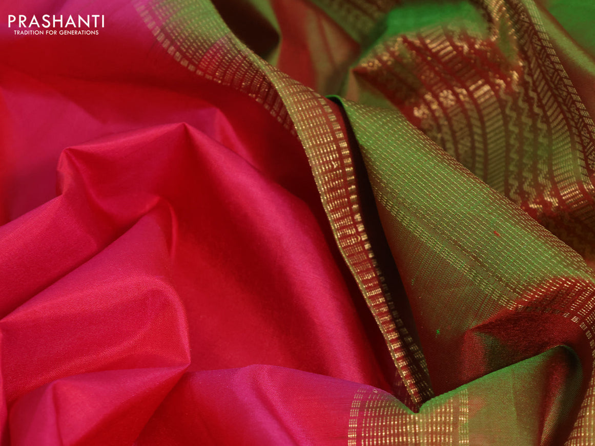 Pure kanchipuram silk saree pink and dual shade of greenish orange with plain body and zari woven border