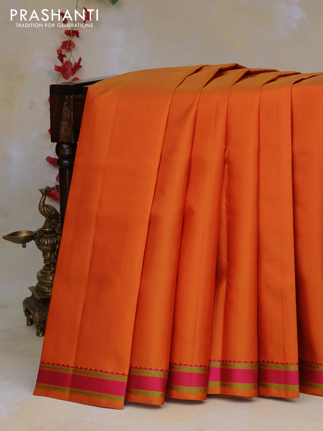 Pure kanchipuram silk saree orange with plain body and thread woven border