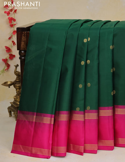 Pure kanchipuram silk saree dark green and pink with zari woven buttas and rettapet zari woven border