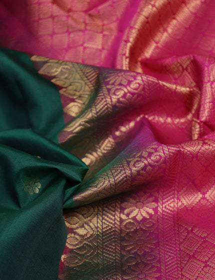 Pure kanchipuram silk saree dark green and pink with zari woven buttas and rettapet zari woven border