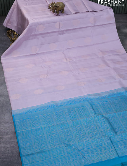 Pure kanchipuram silk saree grey shade and teal green with copper zari woven buttas in borderless style