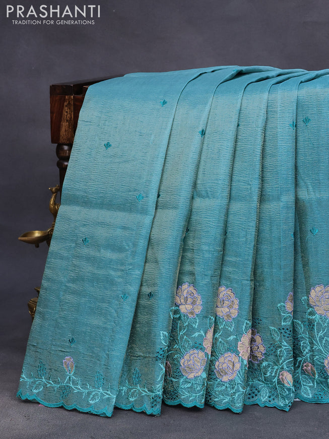 Crush tissue saree teal blue with embroidery work buttas and floral embroidery cut work border