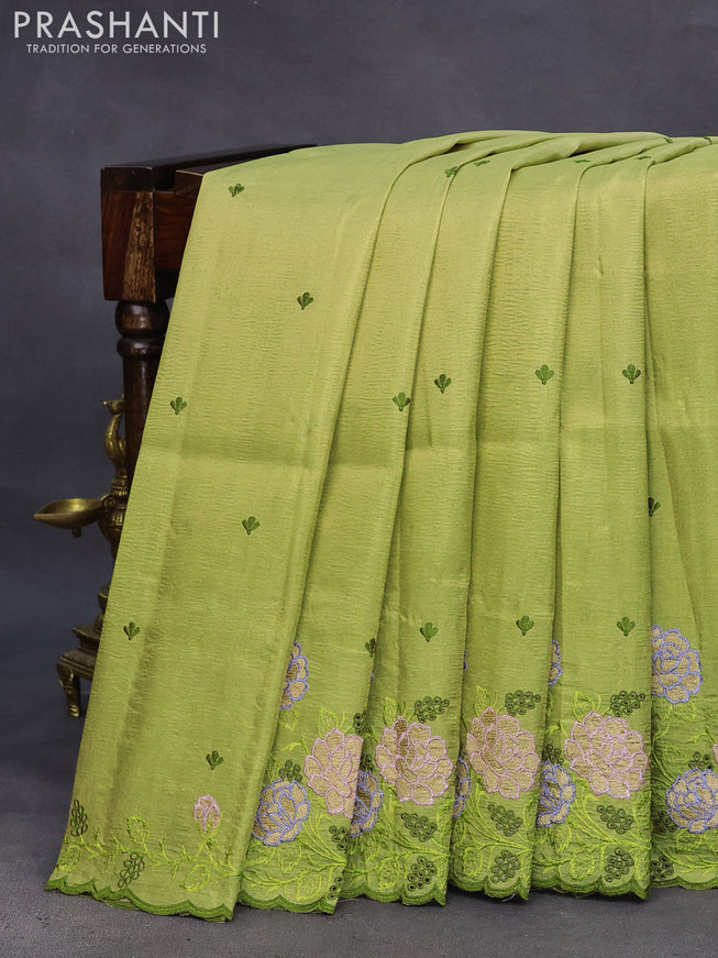 Crush tissue saree pista green and light green with embroidery work buttas and floral embroidery cut work border